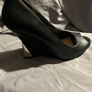 Black wedge with gold accents